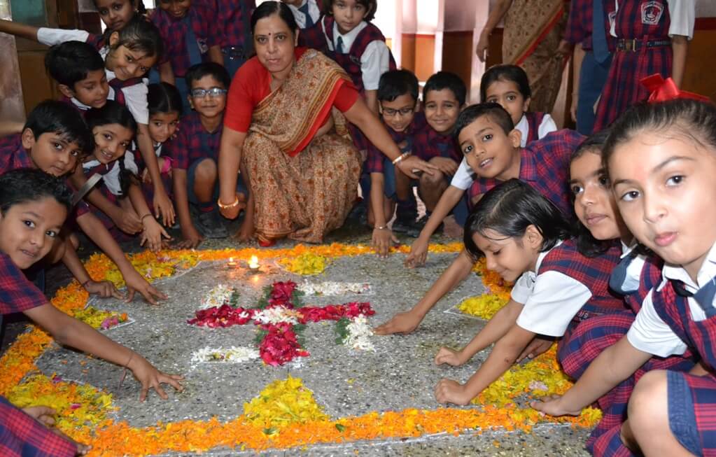 st. anselm's flower rangoli